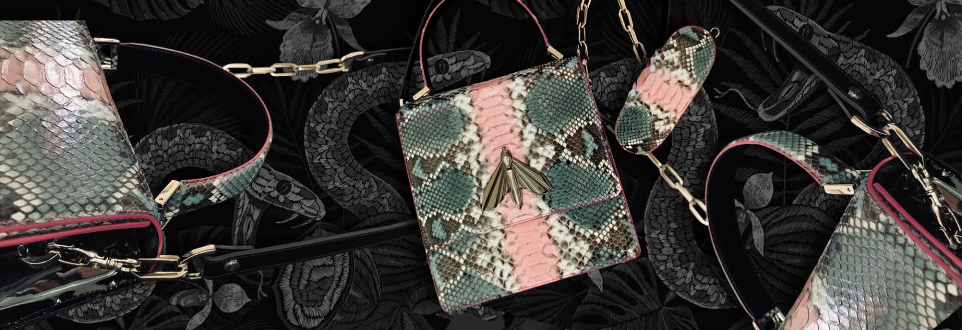 sac a main it bag en peau précieuse,python au motif exclusif, fait à la main, une création couronnée du sphinx à tête de mort