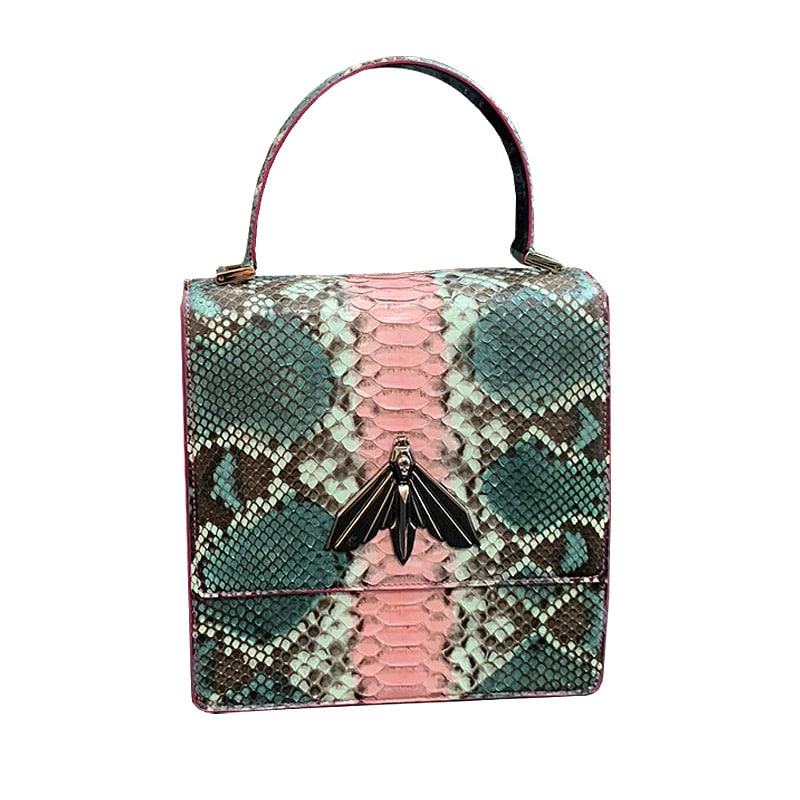 sac a main it bag en peau précieuse,python au motif exclusif, fait à la main, une création couronnée du sphinx à tête de mort
